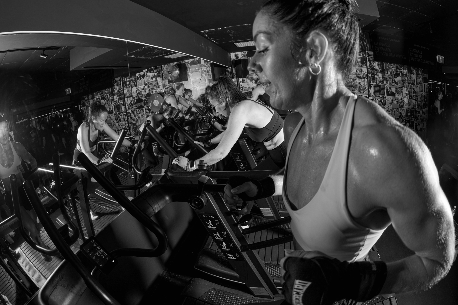 Member running on a Technogym Skillmill at Undercard Boxing Bondi Junction